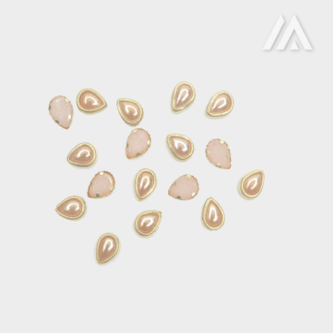 Golden border peach marble drop shape kundan Golden border peach marble drop shape kundan
