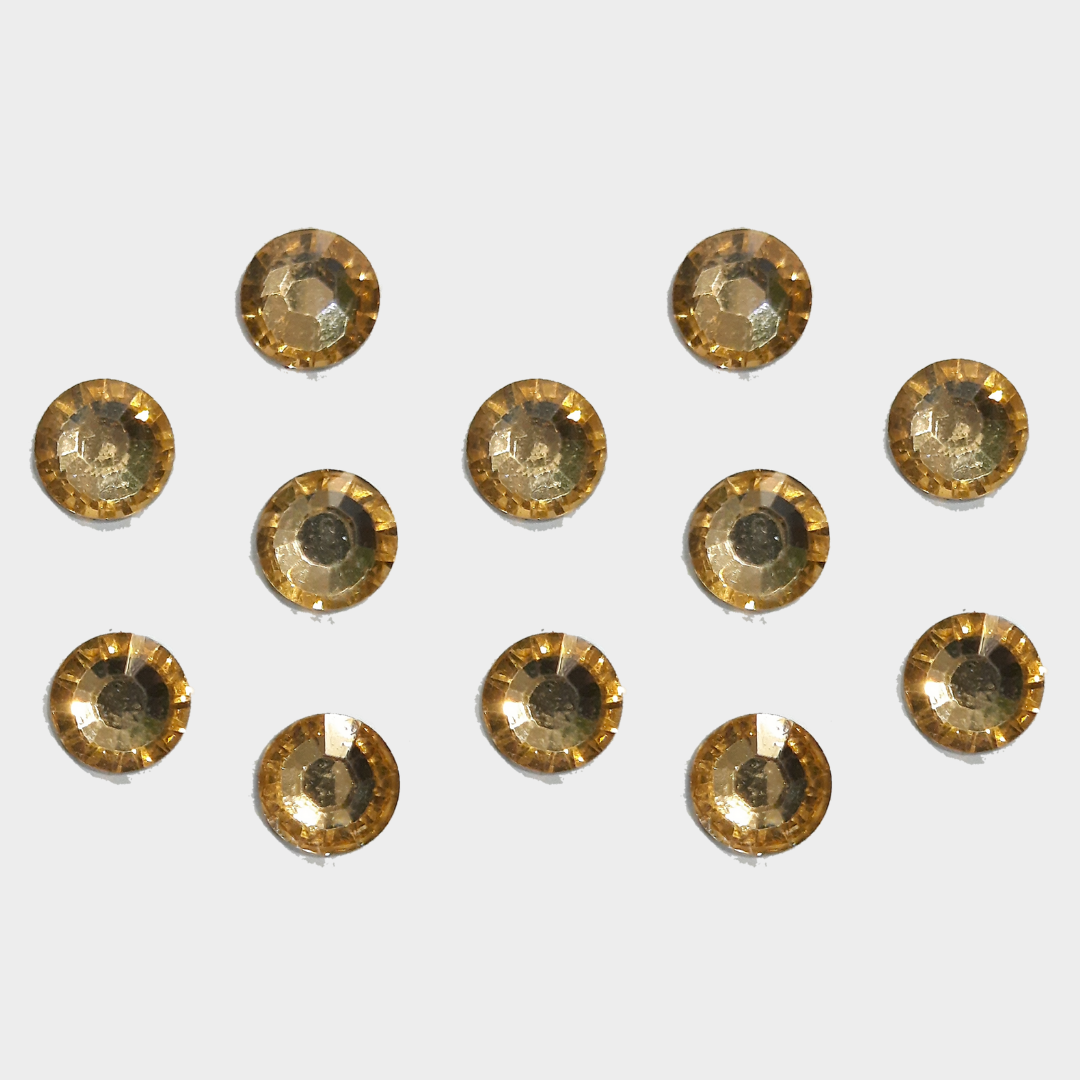 Golden translucent diamond cut petal shape kundan Golden translucent diamond cut petal shape kundan