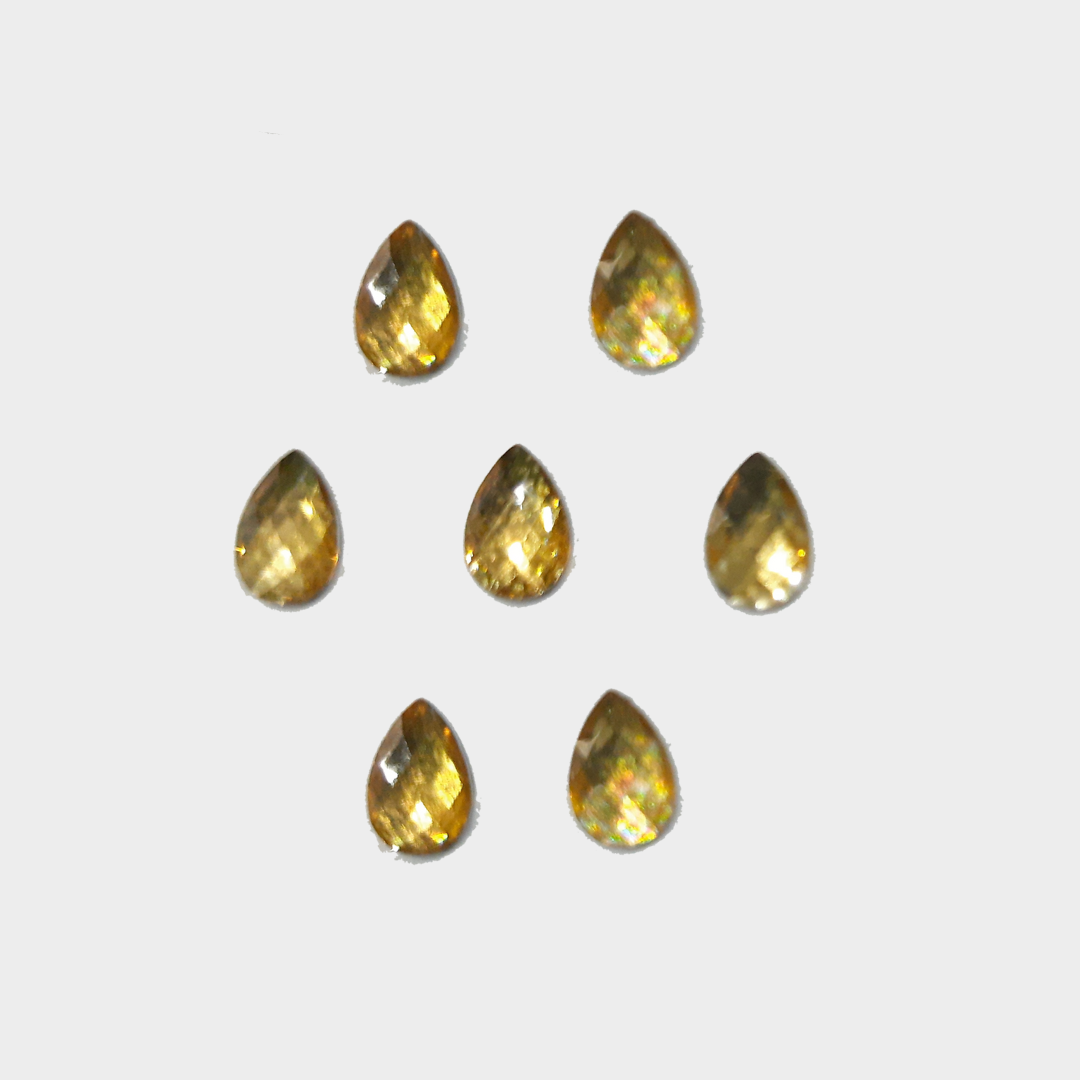 Golden translucent diamond cut drop shape kundan